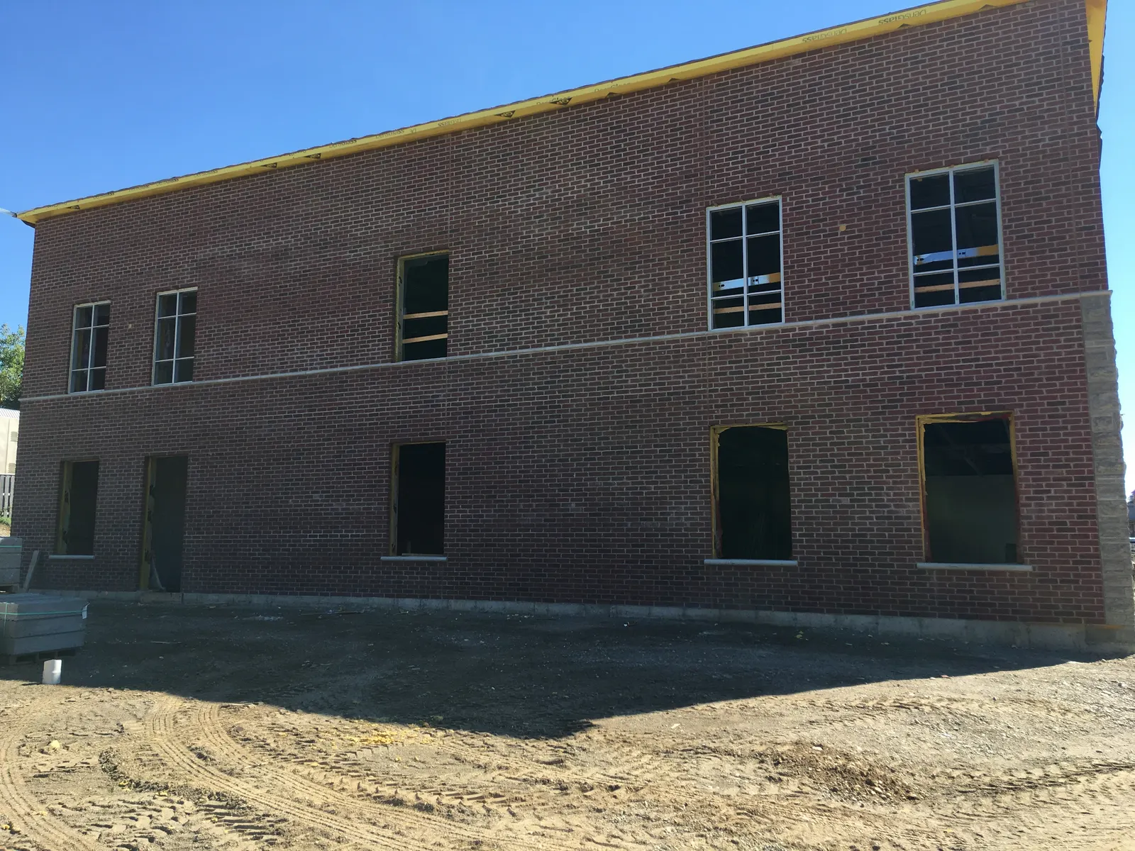 Completed brick commercial building wing