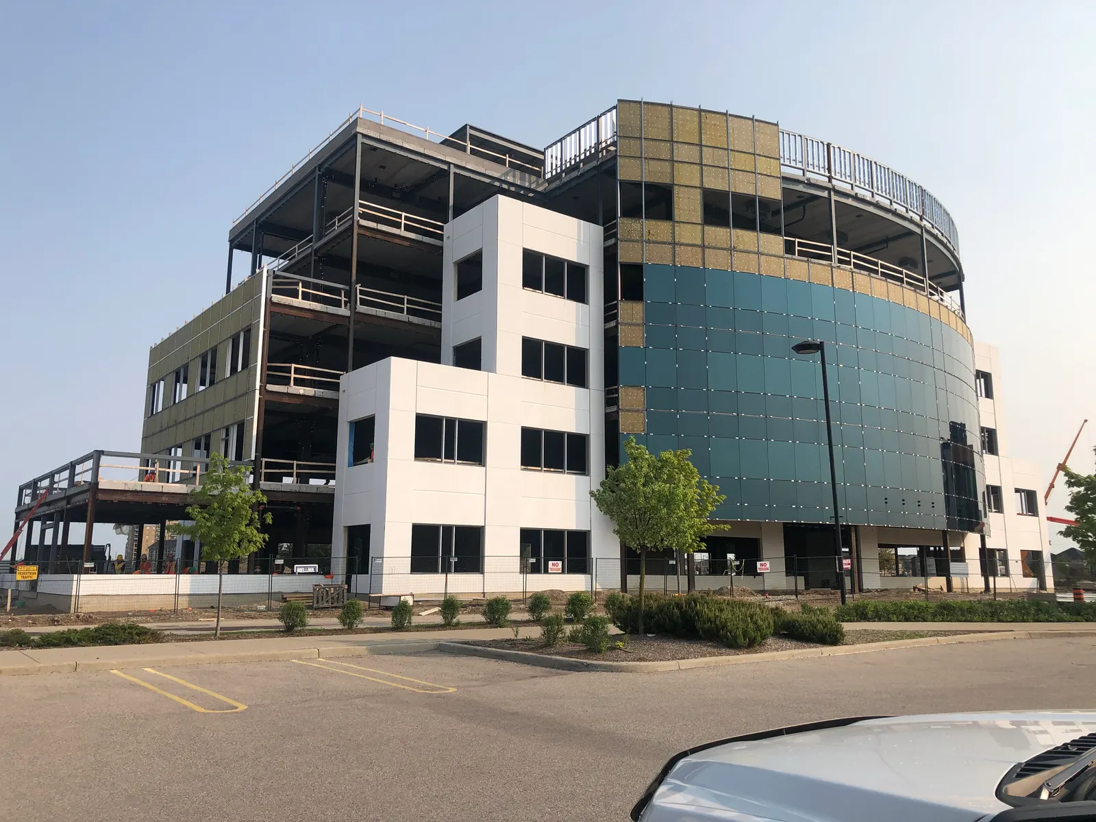 Commercial building with glass and metal-panel envelope