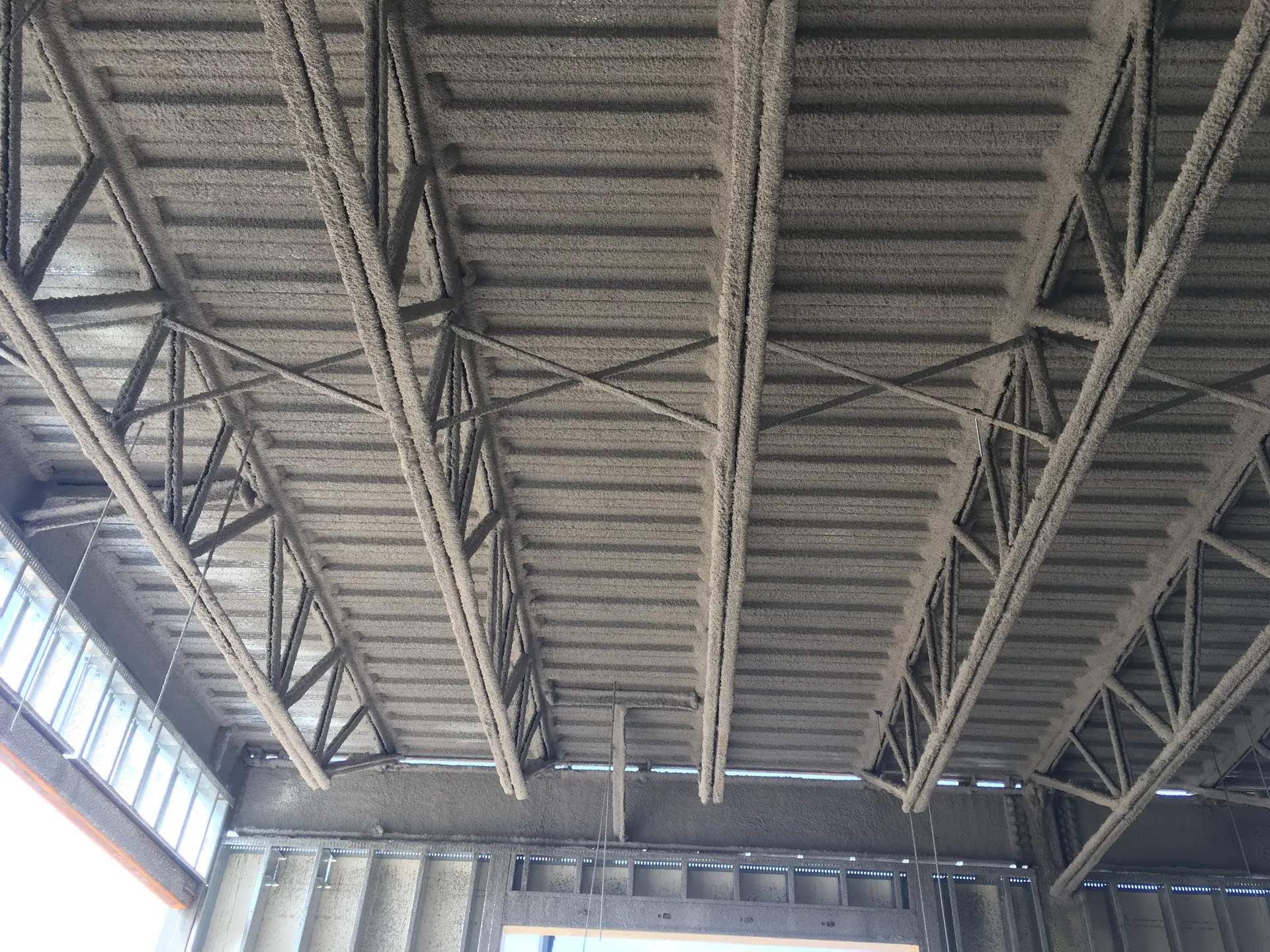 Exposed steel roof joists and deck awaiting fire protection